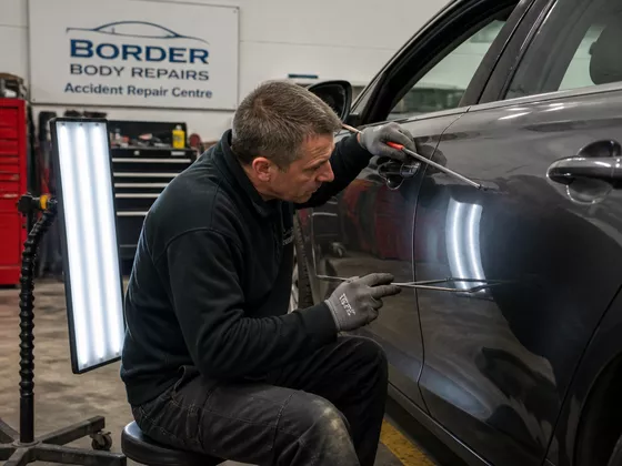 Precision dent removal and metal shaping at Autoline workshop in Lancashire